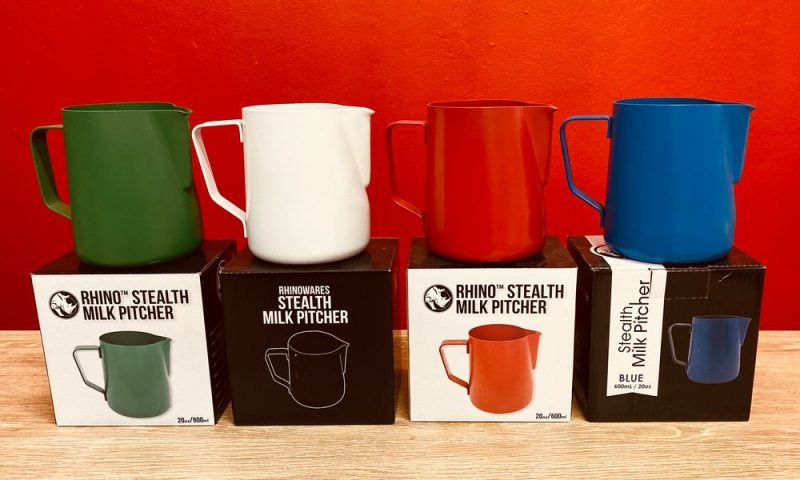 Milk steaming jugs in various colours